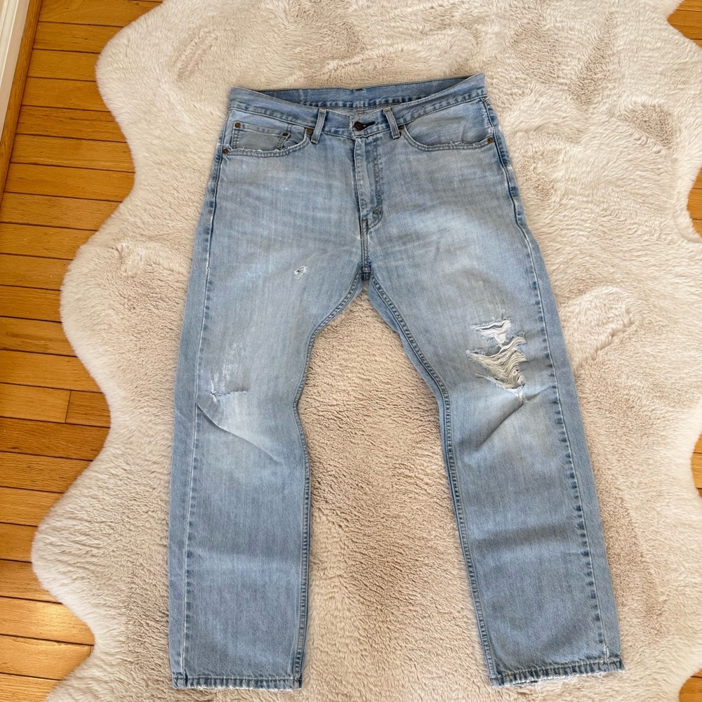 Levi's 505 distressed denim jeans